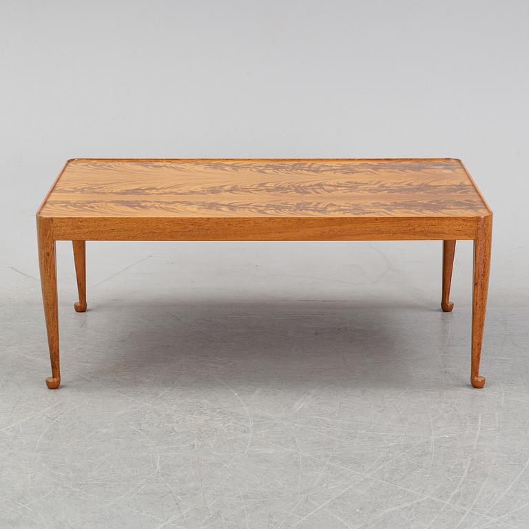 A model 2073 'Diplomat' coffee table by Josef Frank for Firma Svenskt Tenn.