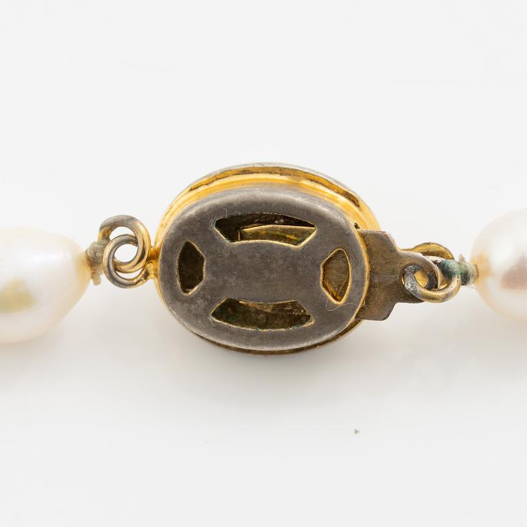 Collier och armband odlade pärlor med silverlås.