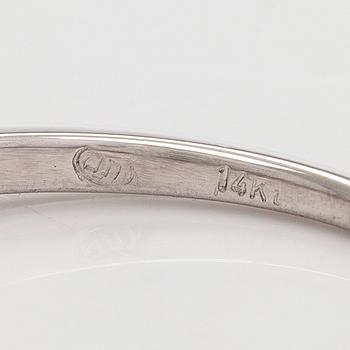 Sormus, 14K valkokultaa, ja briljanttihiottu timantti.