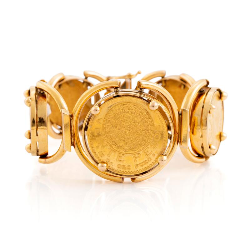 An 18K gold bracelet set with Mexican 22K gold coins.