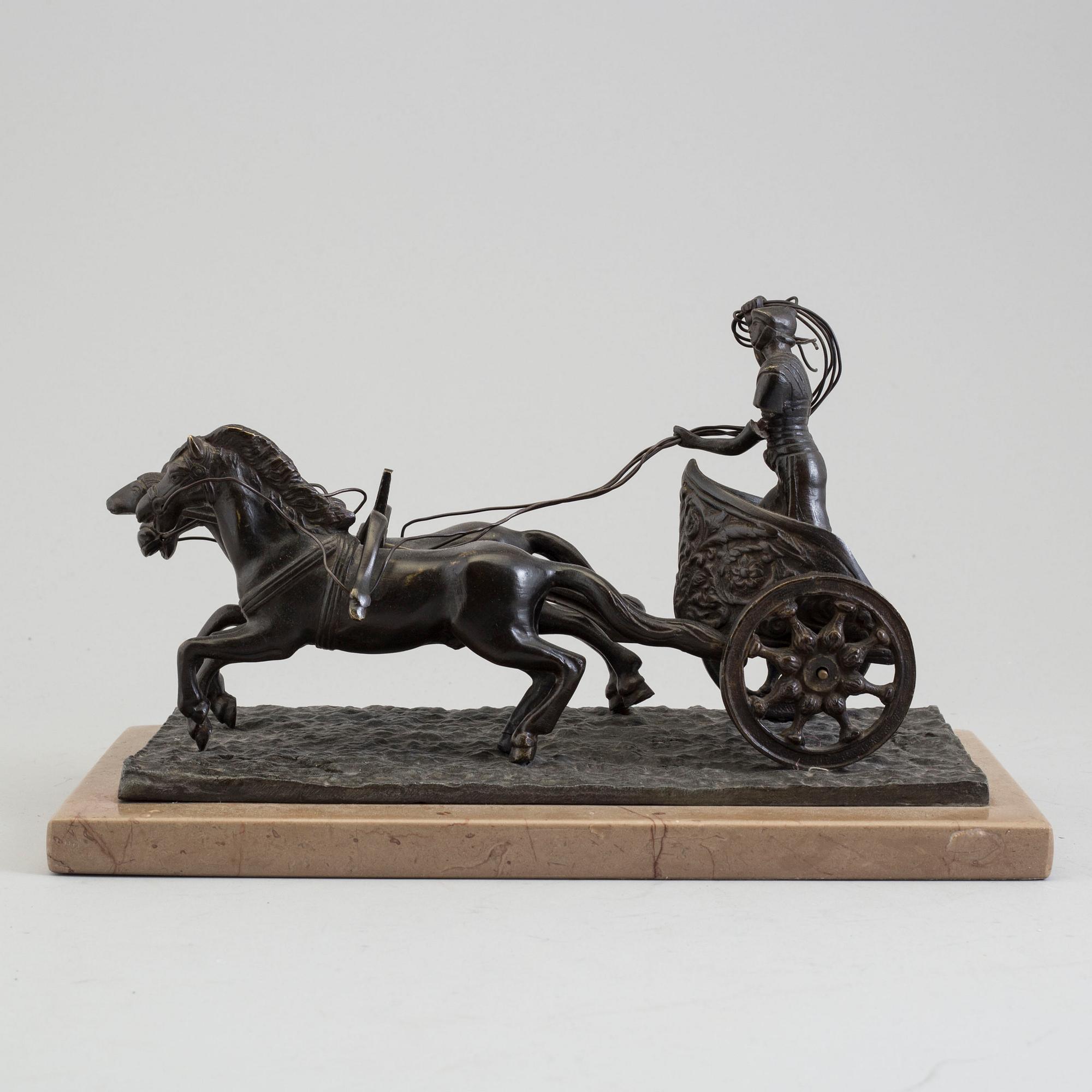 SKULPTURGRUPP, järn/brons, efter antik förebild, 1900-talets första hälft.