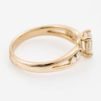 Ring 14K guld med droppslipad diamant, medföljande IGI report.