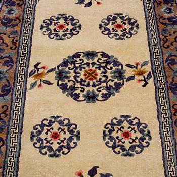 A CARPET, Old silk China, ca 187 x 95 cm.