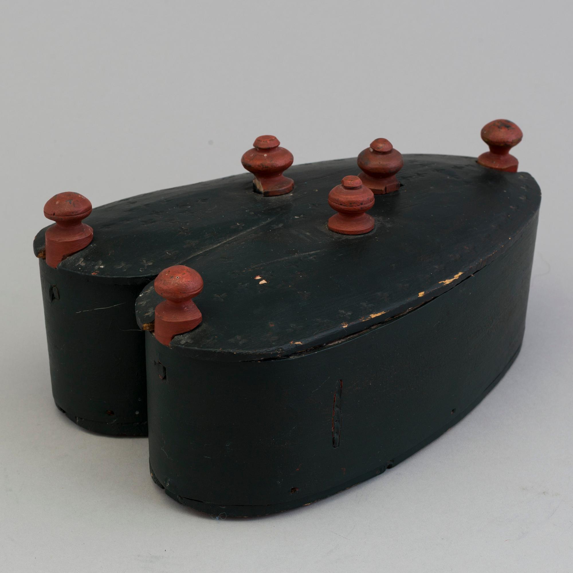 A 19th century folks wooden box in the shape of a loveheart, signed ANS.