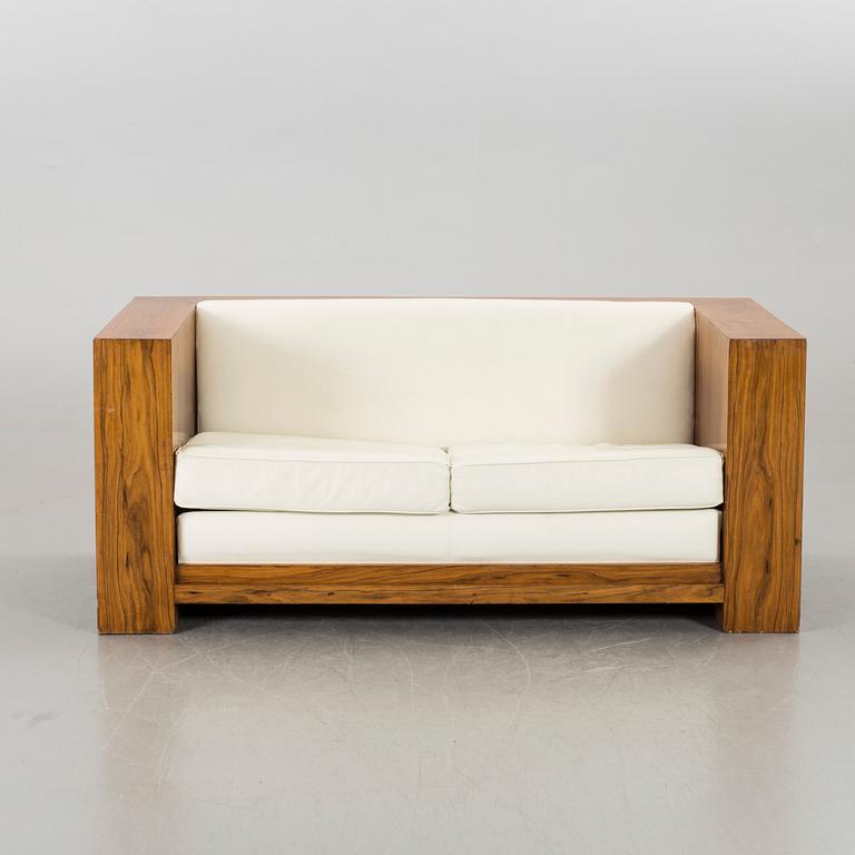 AN ART DECO STYLE SOFA.