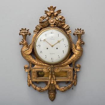 A late gustavian wall clock, signed Beurling, Stockholm. Late 18th / early 19th century.