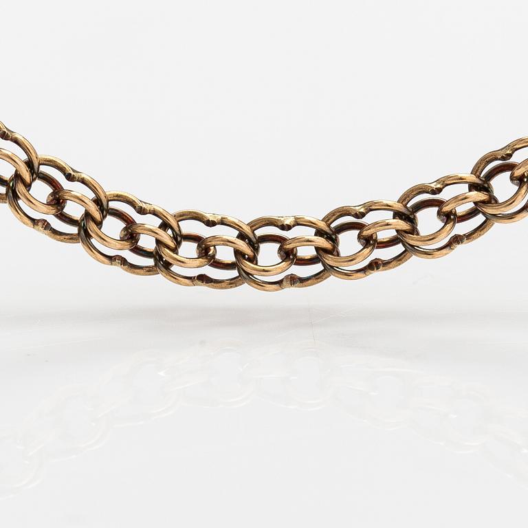 A 14K gold necklace. Aittamäki Ky, Nurmisjärvi 1992.