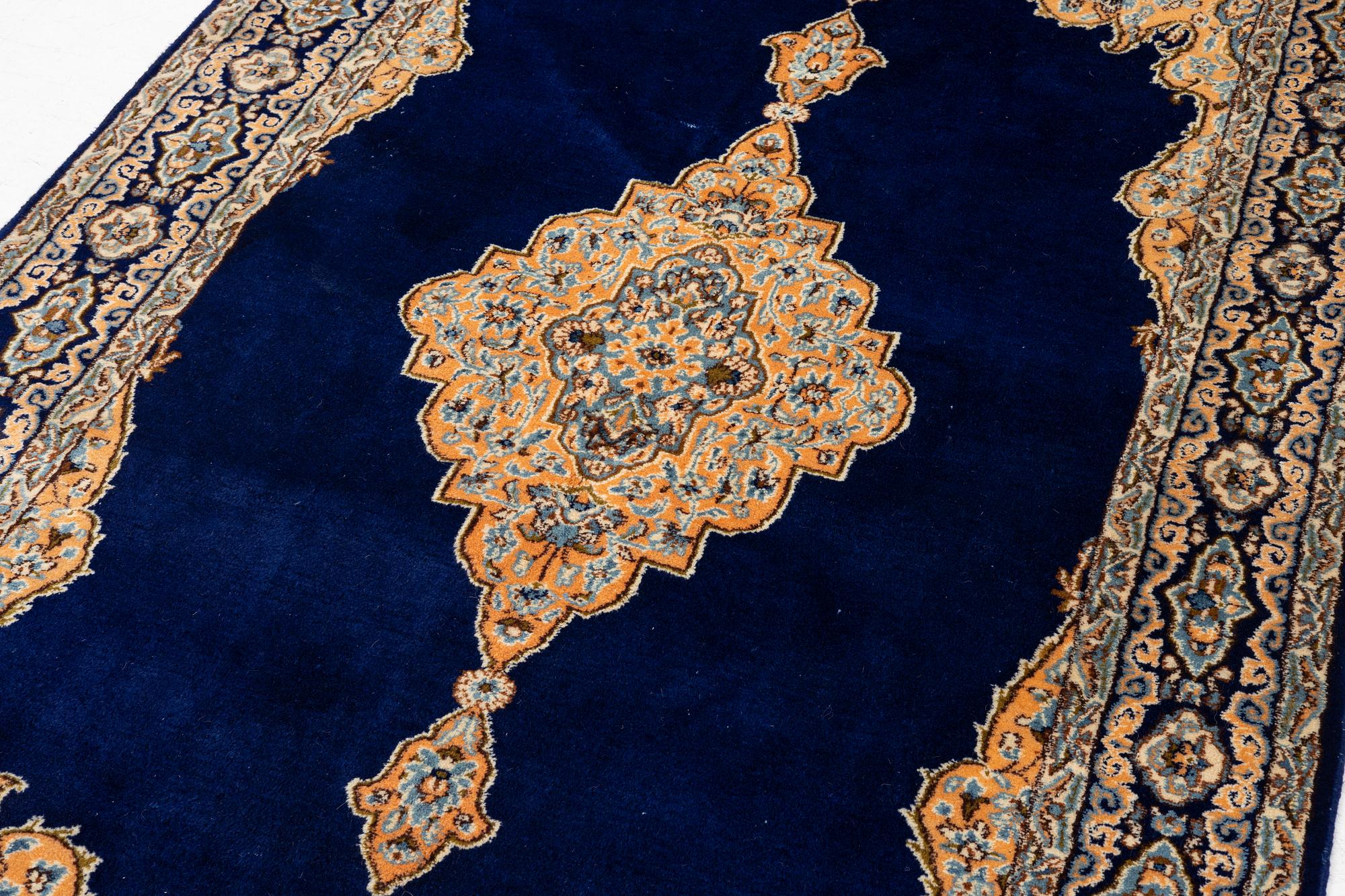 An old Kerman rug, ca. 249 x 148 cm.