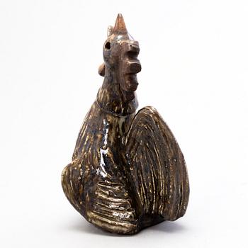 SAKARI VAPAAVUORI, a stoneware sculpture signed VSV Arabia.