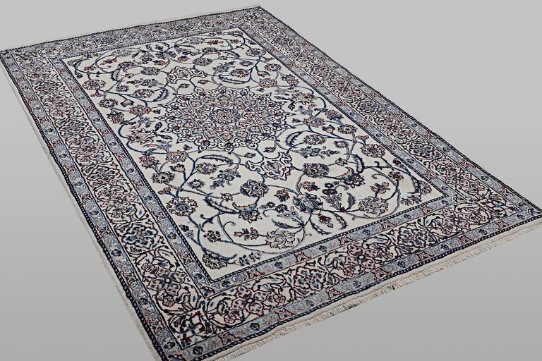A carpet, Nain, part silk, 9 laa, ca 290 x 196 cm.
