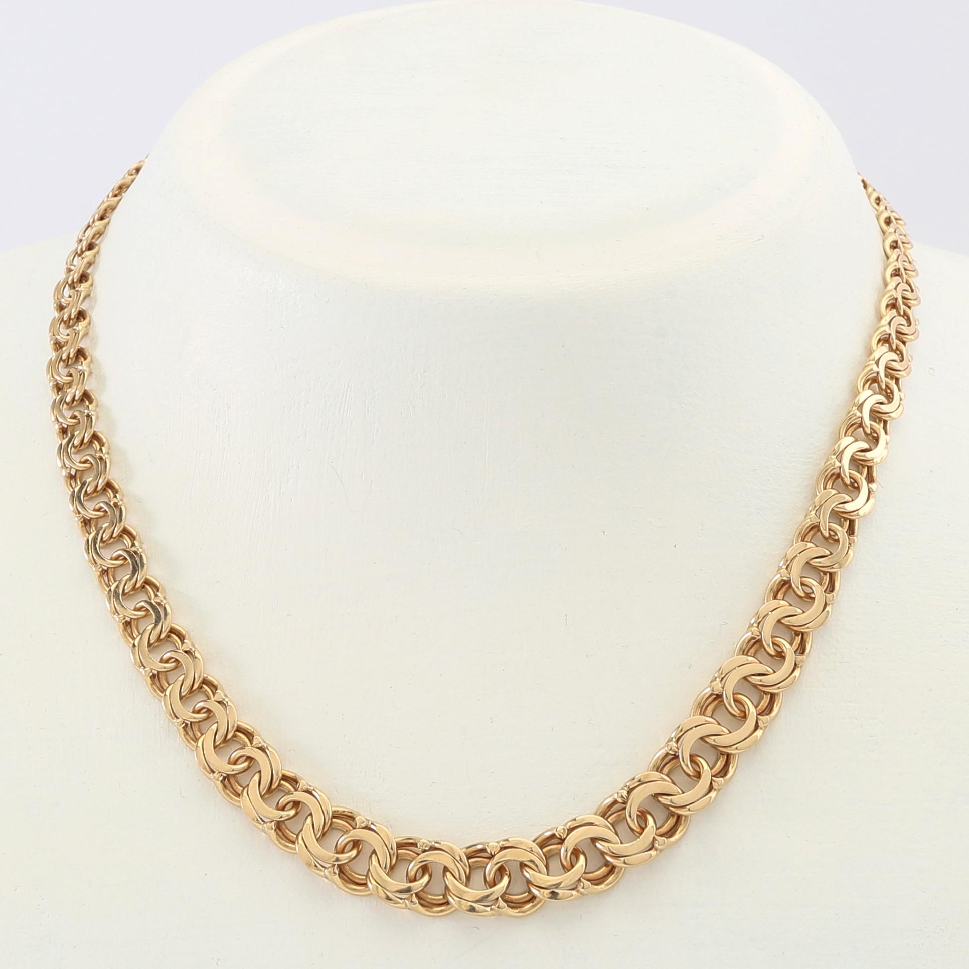 Halsband doserad Bismarck-länk 18K guld.