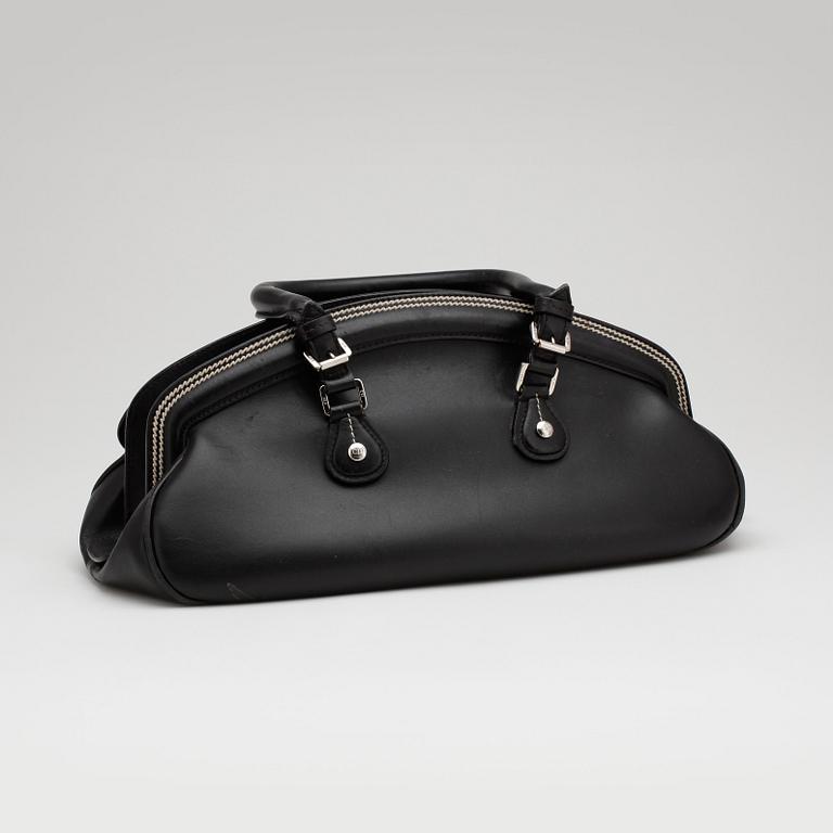 CHRISTIAN DIOR, a black leather handbag.