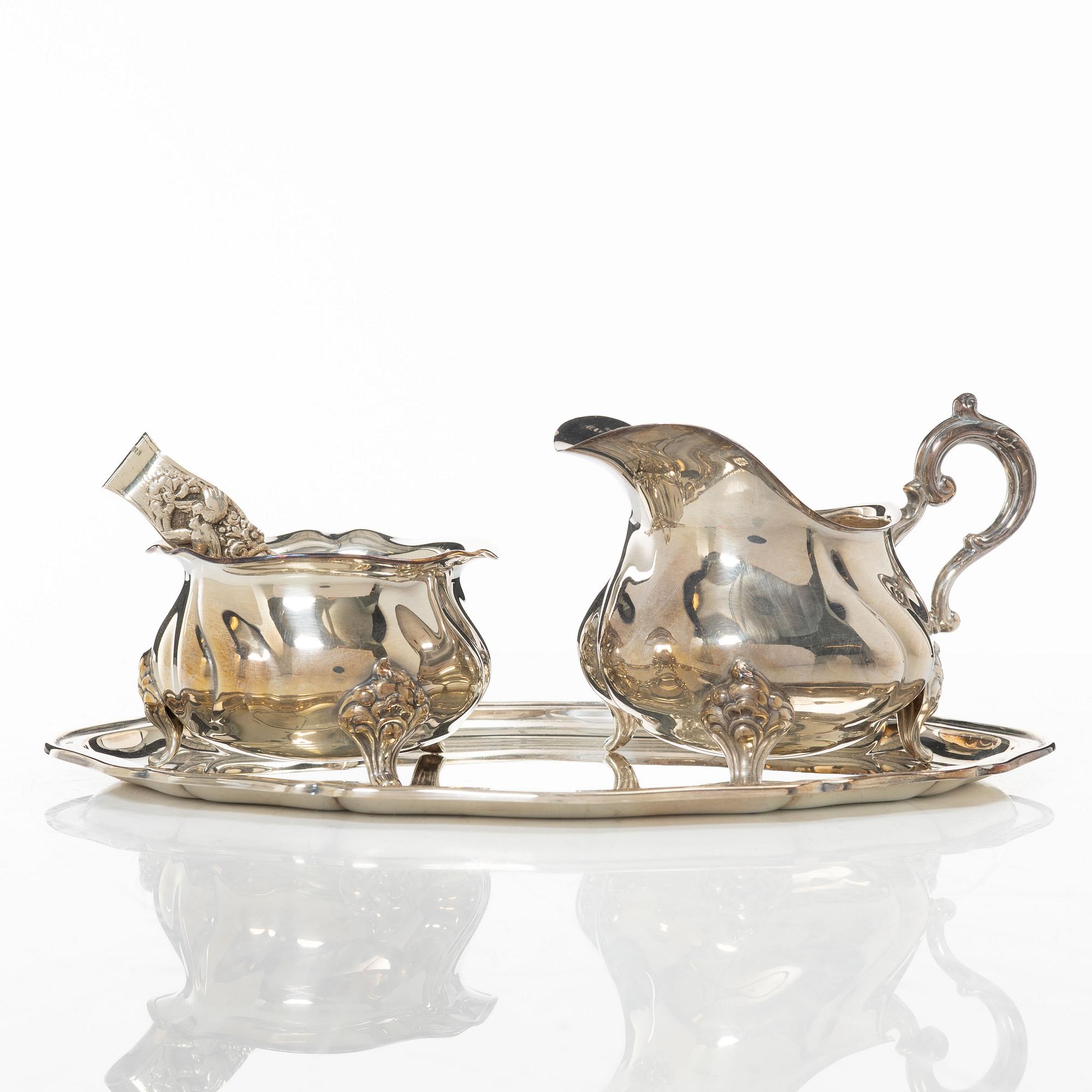 Wilhelm T Binder, sugar bowl, creamer, tray and sugar tong, silver, Schwäbisch Gmünd, Germany, 20th century.