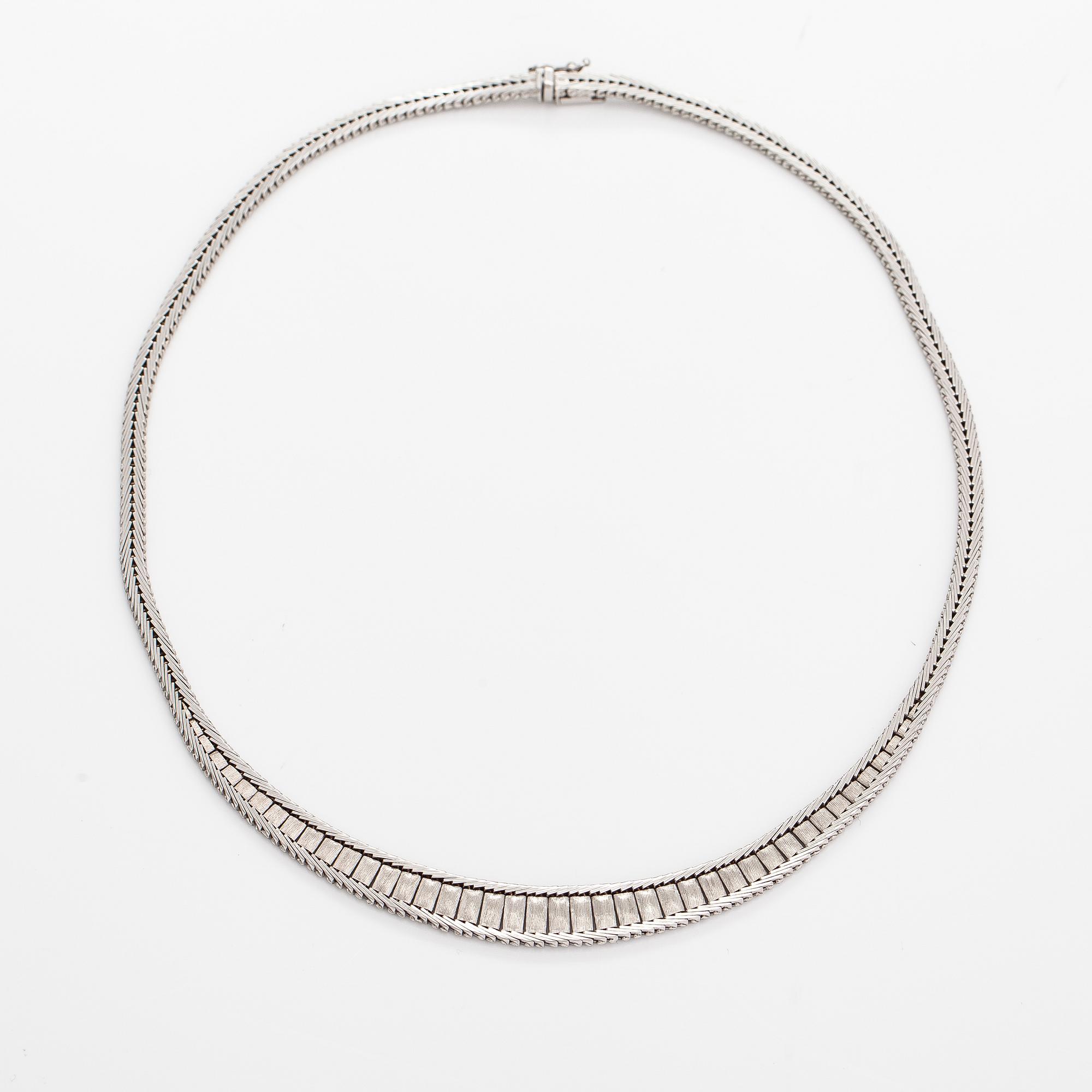 A 14K white gold necklace. Finnish import marks 1979.