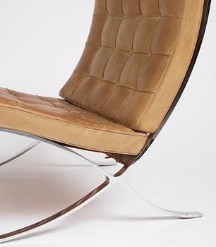 Ludwig Mies van der Rohe, a "Barcelona" easy chair and ottoman, Knoll, 1970s.