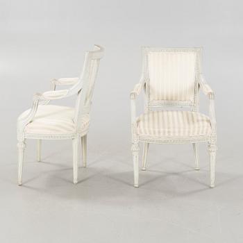 Two gustavian armchairs signed OBS, Olaus Bentsson, Lindome, around the year 1800.