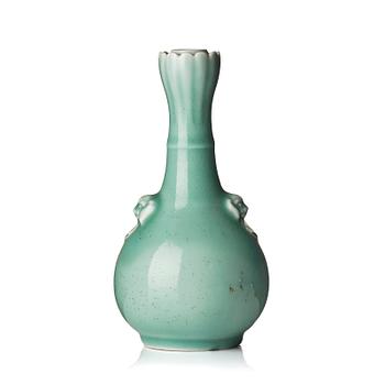 A celadon glazed vas, late Qing dynasty, with Yongzheng mark.