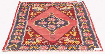 A Kelim carpet, Azerbajjan, dated 1945, 213 x 142 cm.