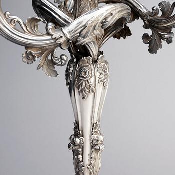 A pair of Swedish mid 19th century silver candelabra, marks of Gustaf Möllenborg, Stockholm 1844.