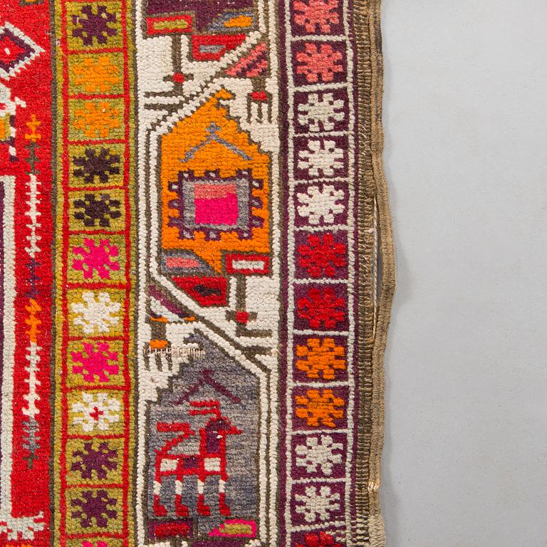 A rug presumably from Karabagh, around 1900. Ca. 305 x 137 cm.