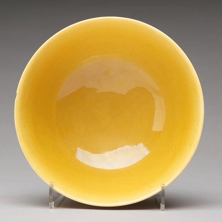 A yellow glazed bowl, Qing dynasty with Daoguang mark.