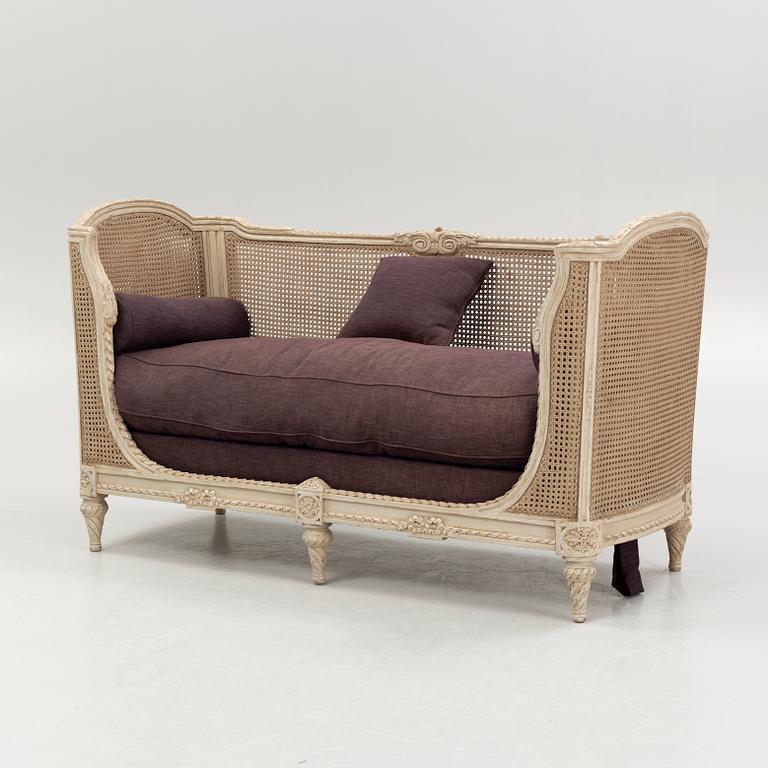 A Louix XVI-style sofa from Massant.