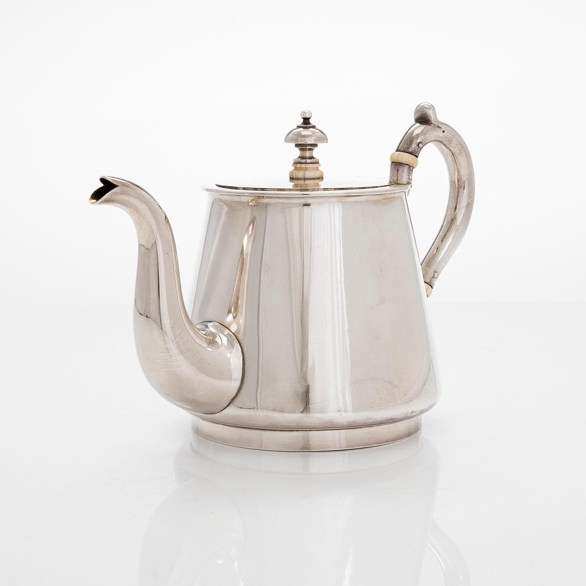 A 19th-century parcel-gilt silver teapot, maker's mark of Johan Heinoin, Saint Petersburg 1878.
