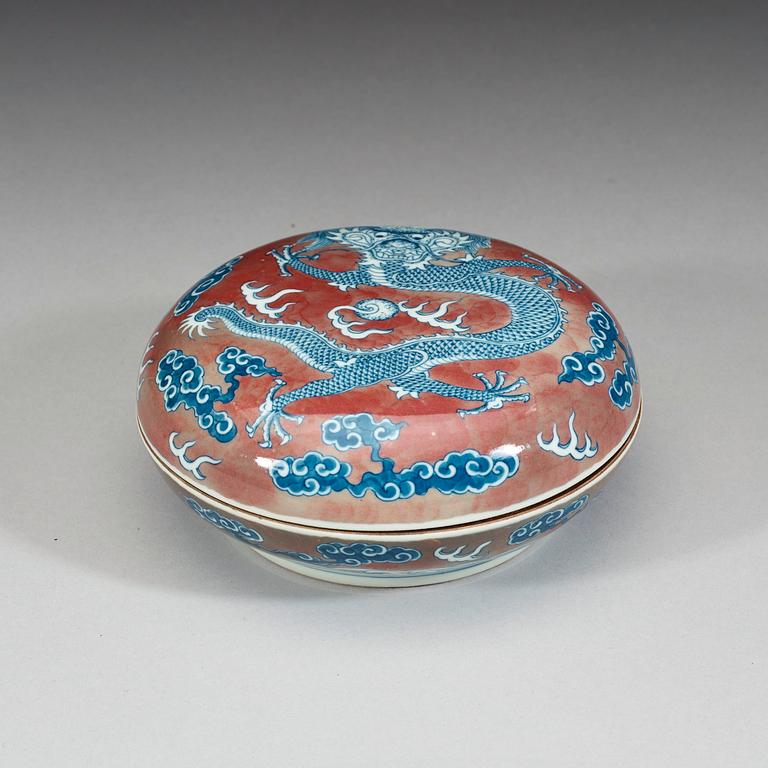 An underglaze blue and peach bloom box with cover, Republic era (1912-1949).