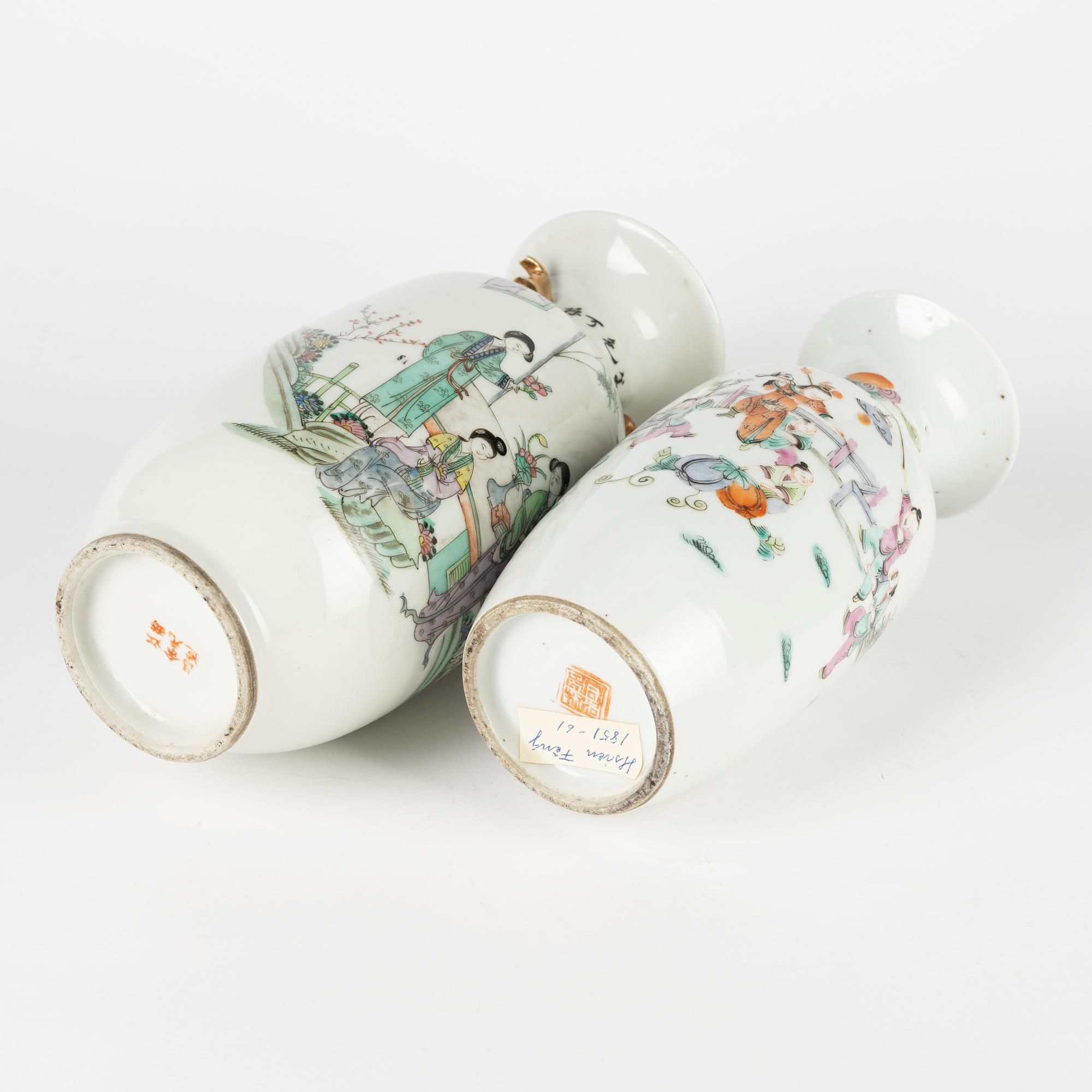 A set of two Chinese famille rose vases and two cups with covers and stands, late Qing dynasty/early 20th Century.