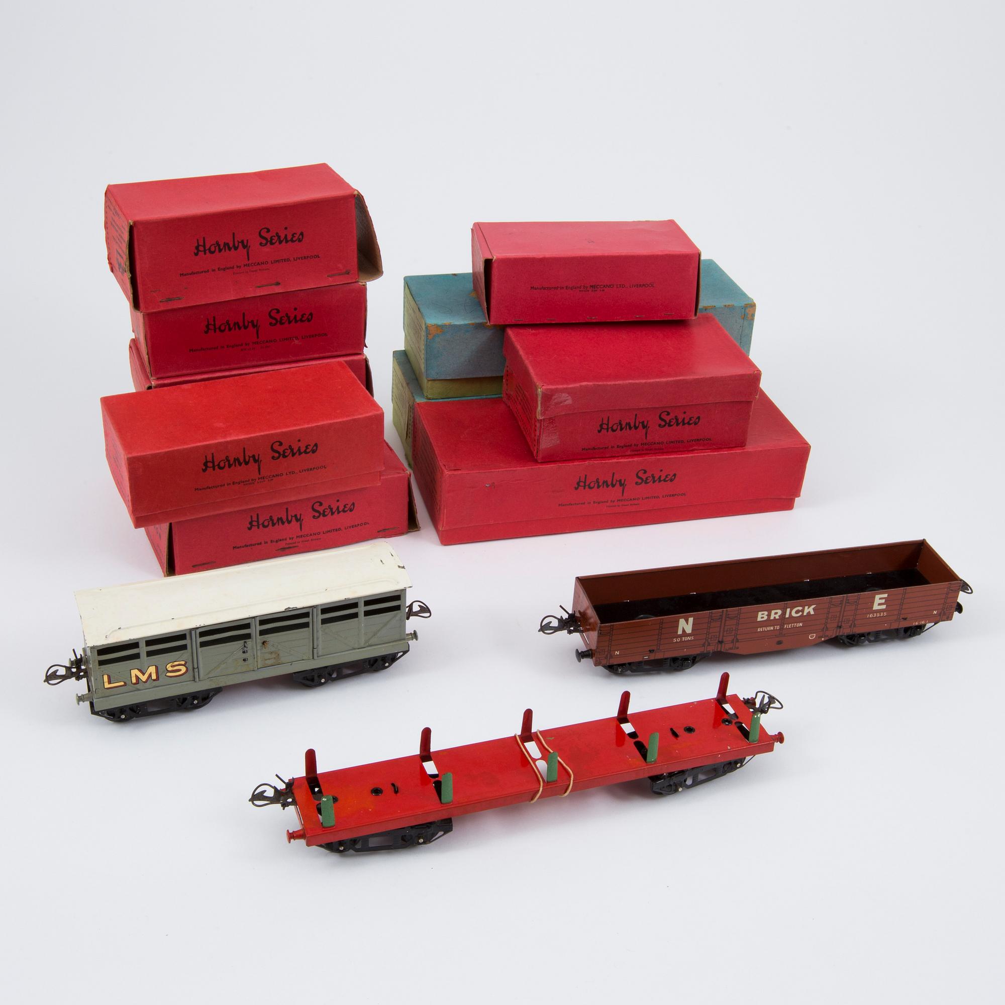 Twelve O-gauge Hornby train wagons England 1930s.