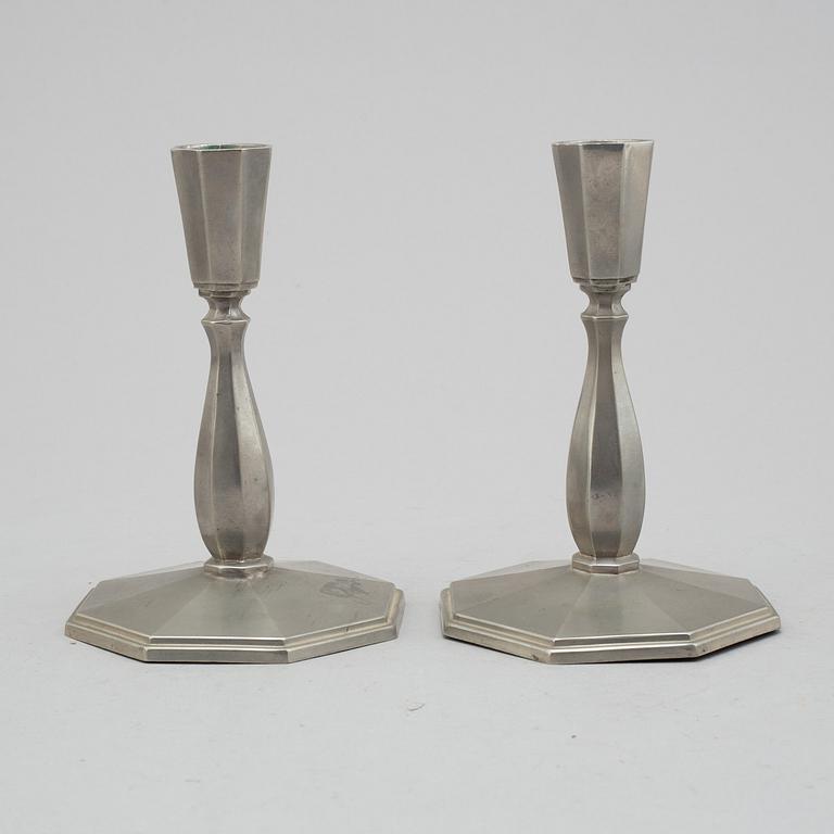 a pair of Art Déco pewter candlesticks by C G Hallberg 1933.