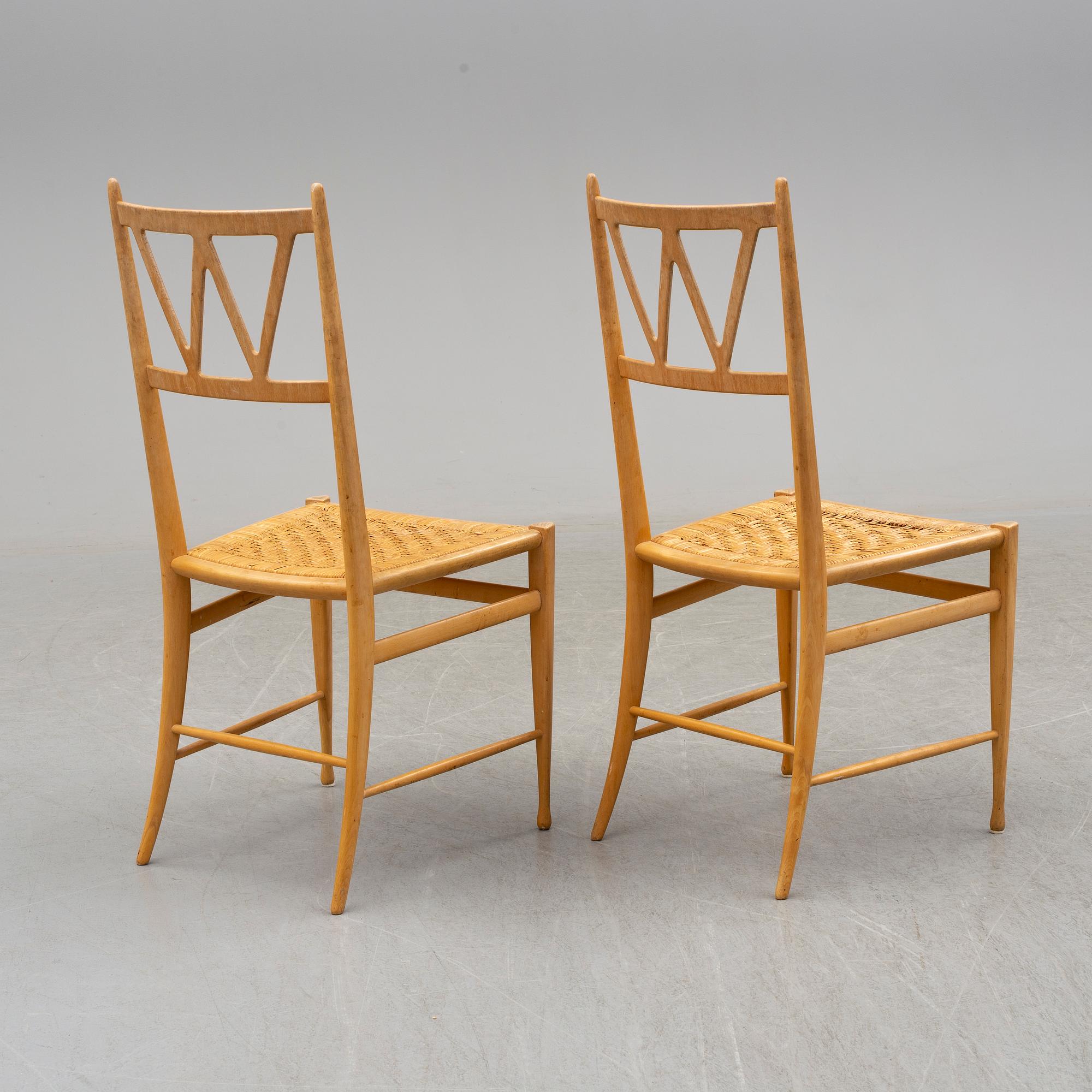 Two beech chairs, mid 20th Century.