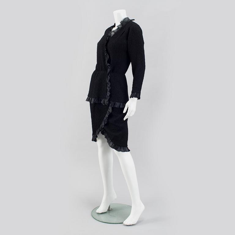 A two piece suit from Saint Laurent rive gauche.