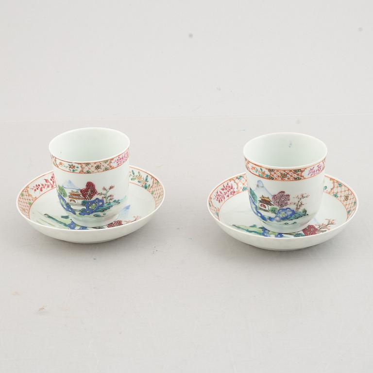 A Pair of Famille Rose export porcelain cups with saucers, China, Qianlong (1736-95).