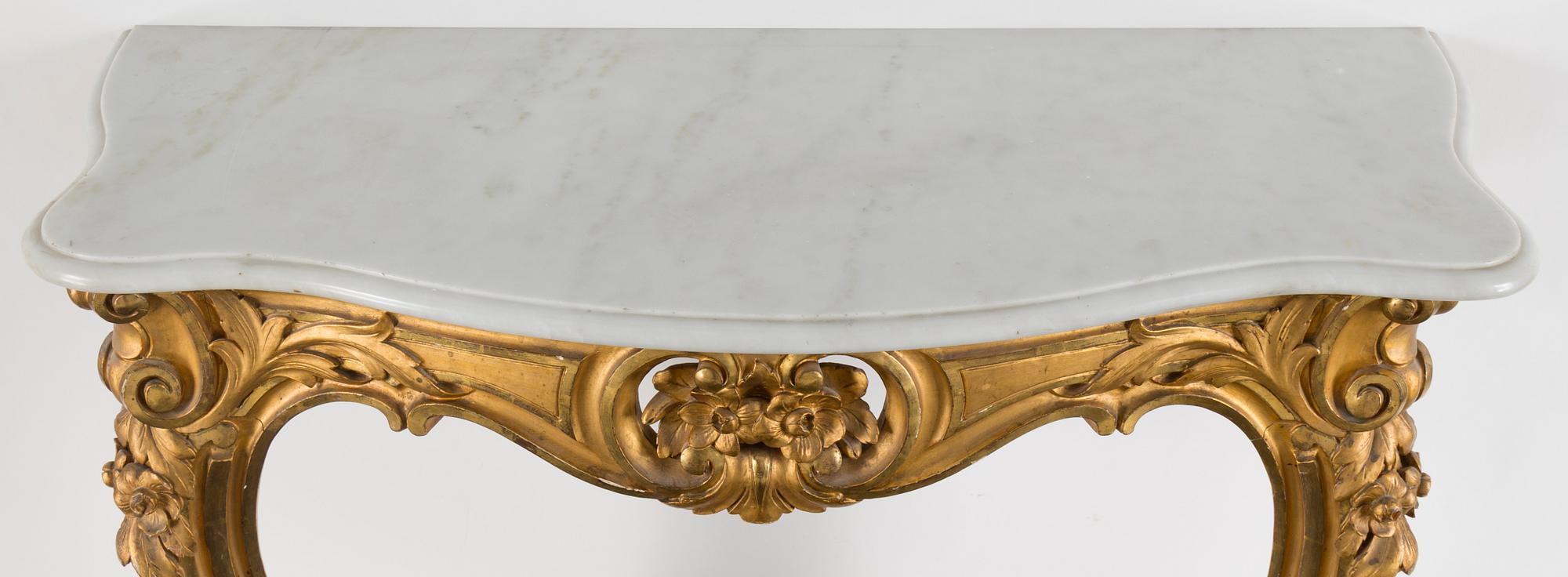 A gilt wood mirror and marble top console table, early 20th Century.