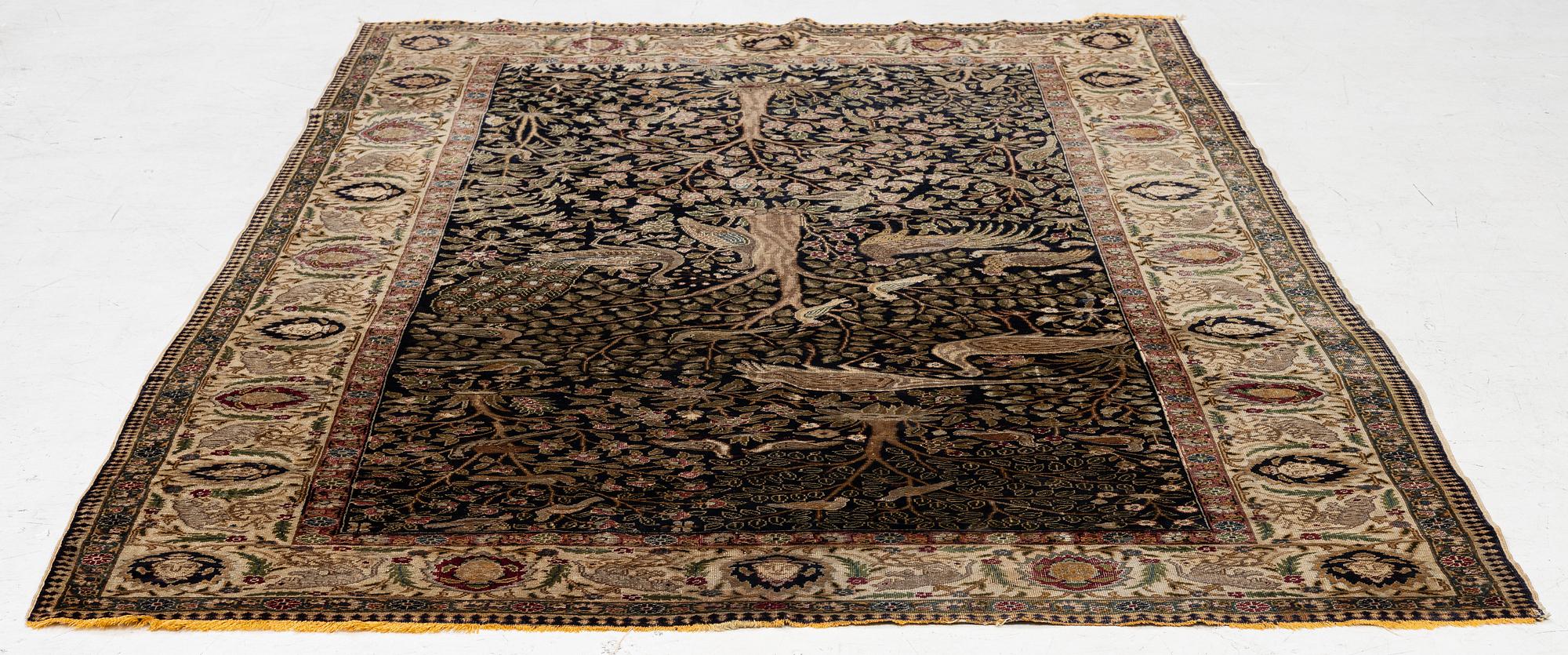 An antique silk Paderma/Kayseri rug, c. 217 x 153 cm.