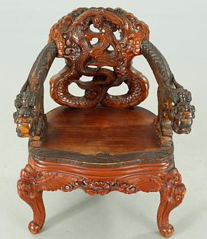 A Japanse arm chair, 20th Century.