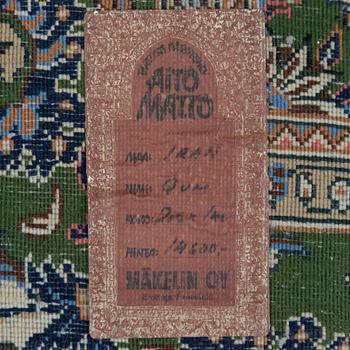 An oriental carpet. Qum. Circa 201x140 cm.