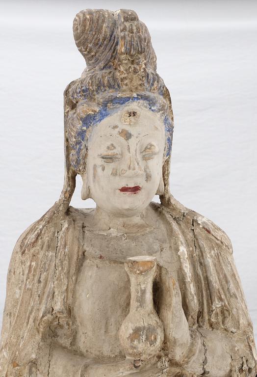 A wooden sculpture of Guanyin, Ming dynasty (1368-1644).