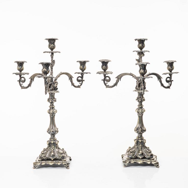 A pair of silver plated Rococo style candelabra, 20th century.