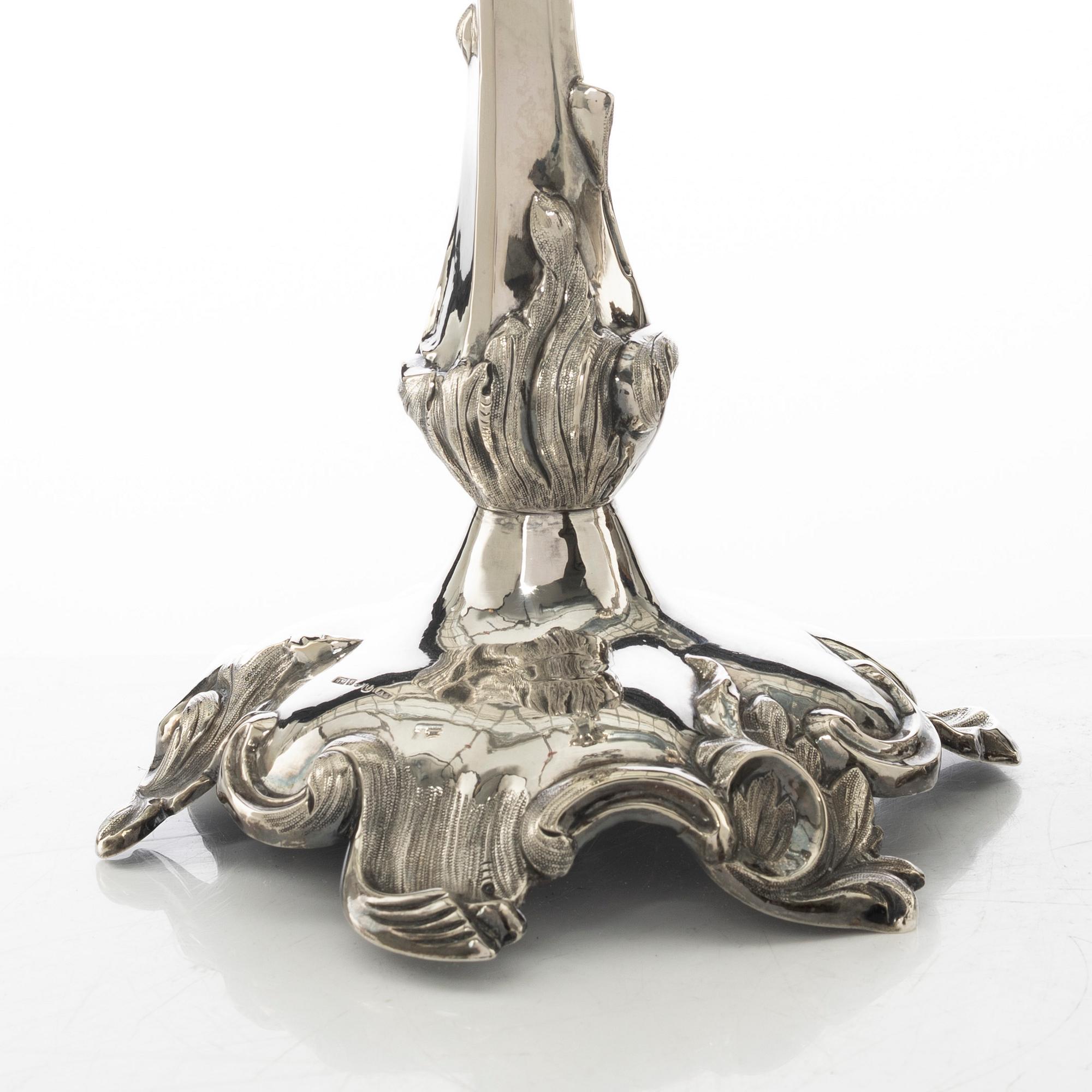 Gustaf Möllenborg, a pair of neo-rococo silver candle sticks, Stockholm, Sweden, 1855.