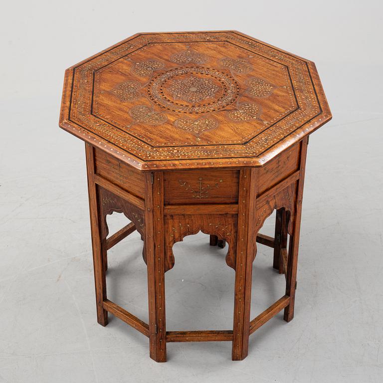 An Anglo Indian folding octagonal side table.