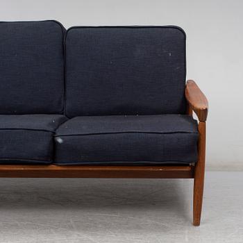 ERIK WØRTS, a 'Kolding' walnut sofa from IKEA, 1960's.