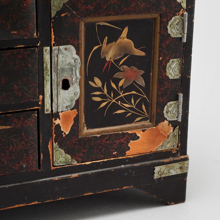 A small japanese cabinet from the first half of the 20th century.