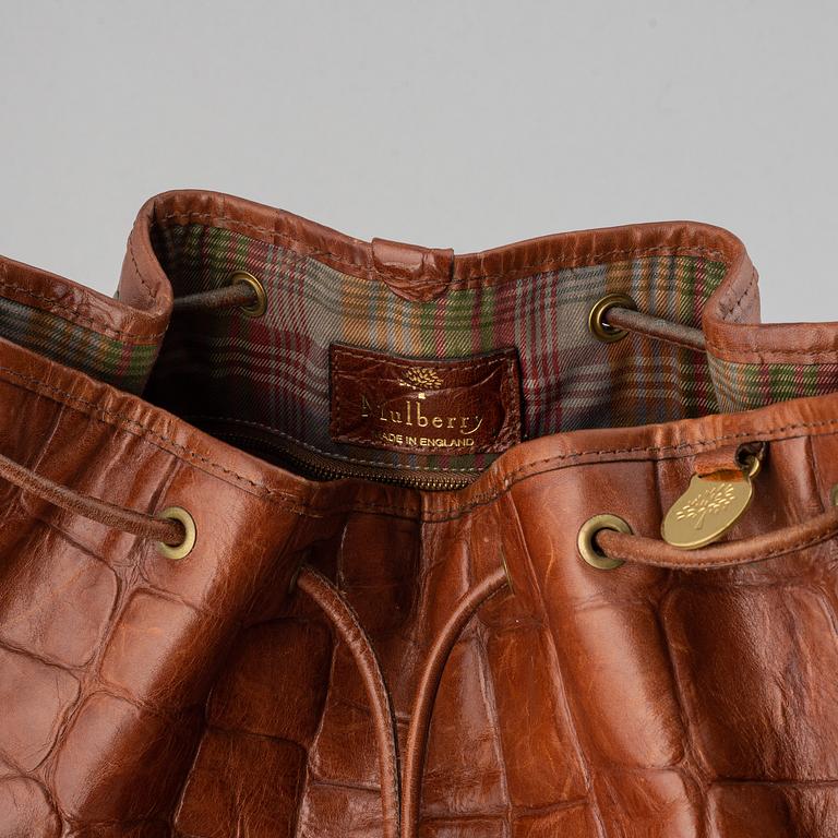 MULBERRY, a leather drawstring bag.