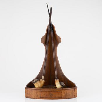 A pipe stand and two pipes, second half of the 19th century.