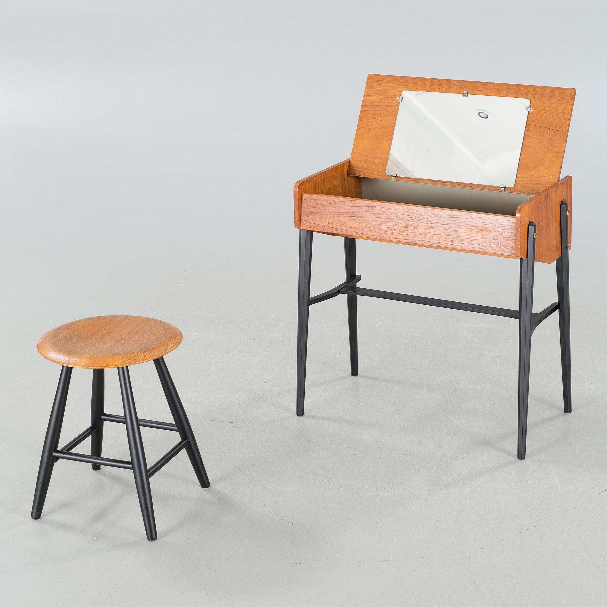 A mid 20th century dressing table and stool.