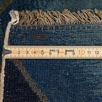 A Chinese ’phoenix rug’, 20th century, c. 181 x 93 cm.