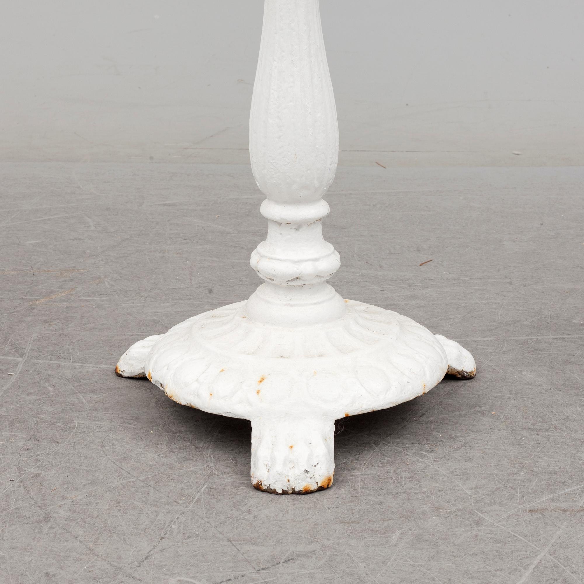 an early 20th century cast iron table.