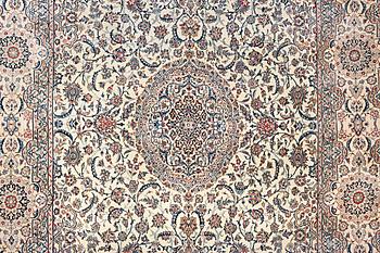 A Nain carpet, part silk, 9 laa, c. 453 x 298 cm.